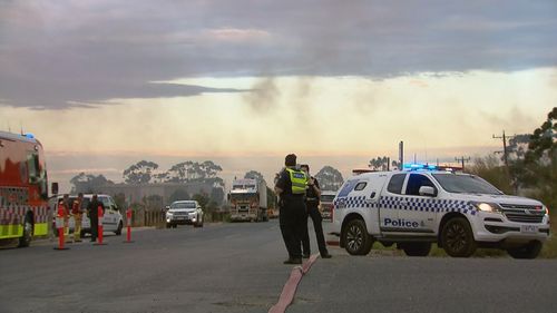 Police units and firefighter crews at the Old Geelong Road tip fire.