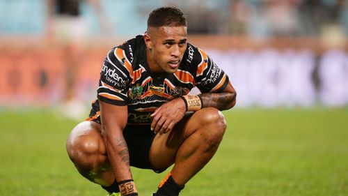 Michael Chee Kam rests during a game against the South sydney Rabbitohs in 2018. Chee Kam has played 54 first grade games in his NRL career.