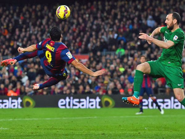 Messi scores hat-trick, Suarez steals show