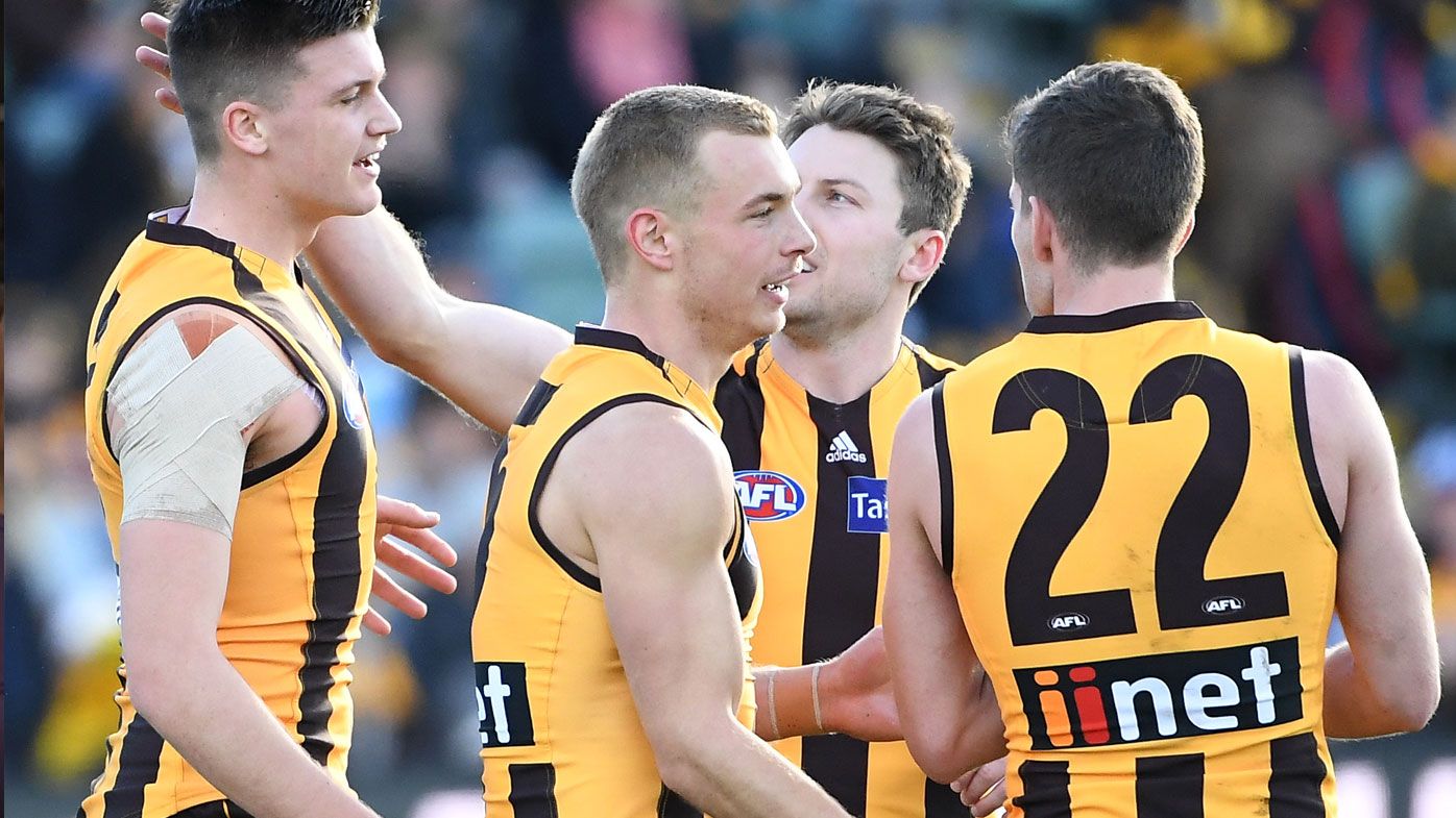 AFL: Hawthorn Hawks keep finals hopes alive with crucial win over Dockers