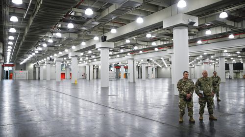 U.S. National Guard members stand at the Jacob Javits Center, in New York. 