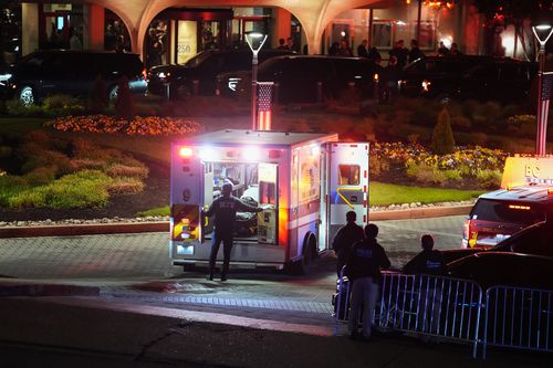 An ambulance responds to an incident at the Washington Hilton during the White House Correspondents Dinner, Saturday, April 25, 2026, in Washington. (AP Photo/Allison Robbert)