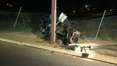 The woman died at the scene after the car crashed into the power pole. (9NEWS)