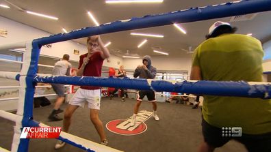 Sydney priest Father Dave Smith prays for help to save boxing gym