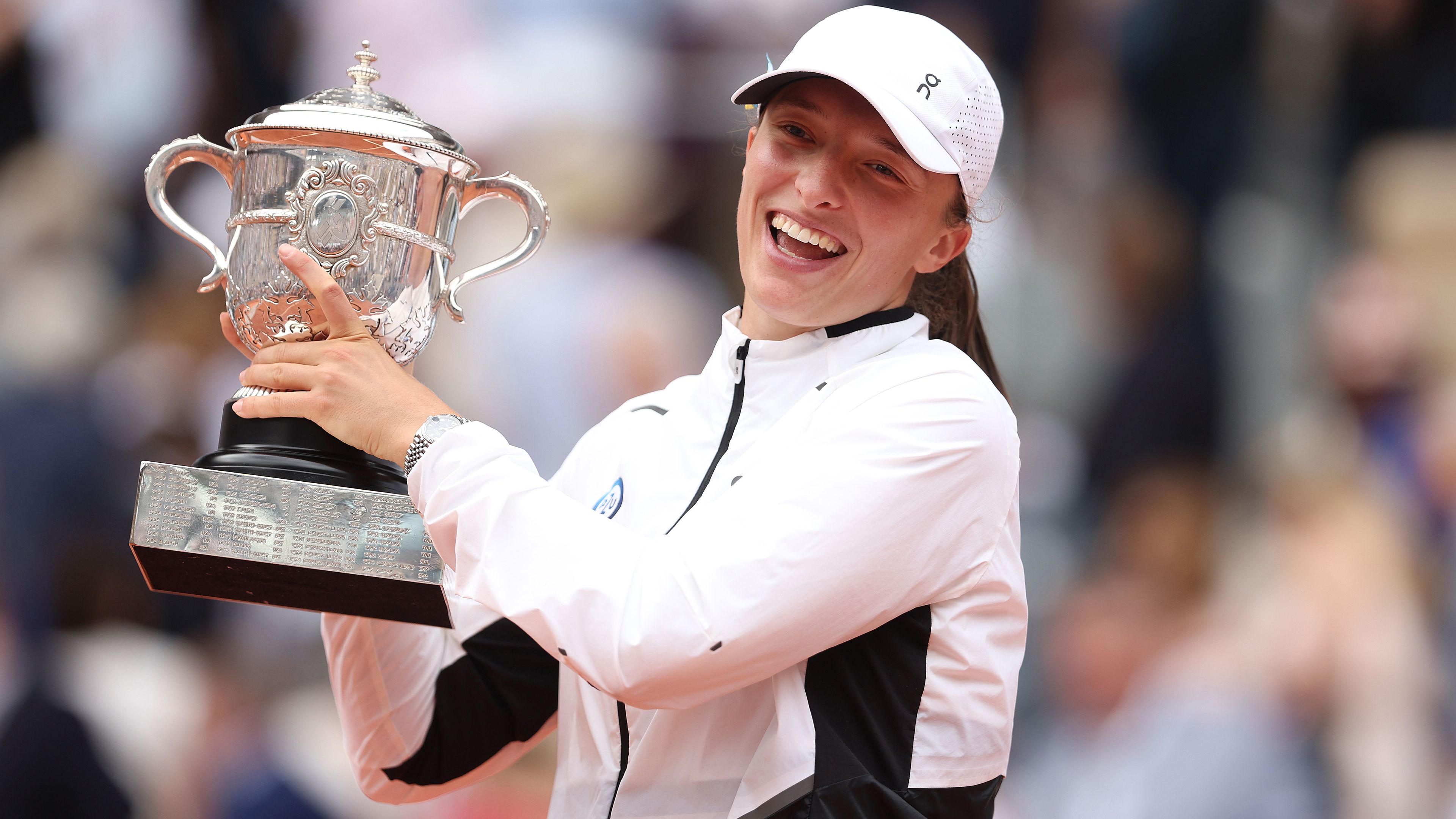 Iga Swiatek of Poland celebrates after victory against Karolina Muchova of Czech Republic at the French Open.