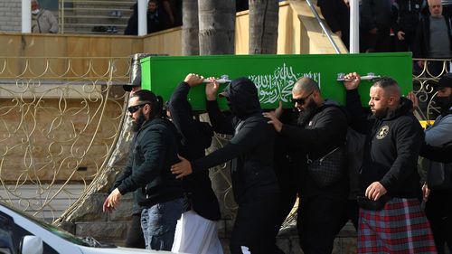 Men carry the coffin of Bilal Hamze after the funeral at Lakemba Mosque. Bilal Hamze funeral