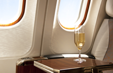 Business class seat with champagne