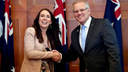 New Zealand Prime Minister Jacinda Ardern greets Australian Prime Minister Scott Morrison in Singapore.