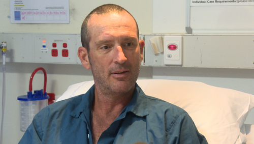 A Darwin man is recovering in hospital after being bitten by a shark while fishing with friends. 

