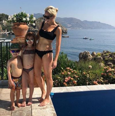 Roxy Jacenko in a bikini from&nbsp;Marysia and&nbsp;Céline sunglasses with her children Pixie Rose and Hunter Curtis in Taormina, Sicily