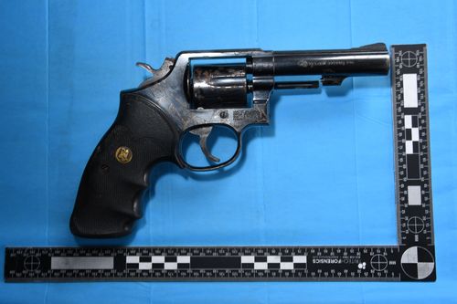 One of the handguns found by police in their investigation.