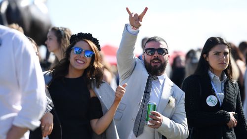 Thousands of people donning black and white attended Derby Day yesterday. (AAP)