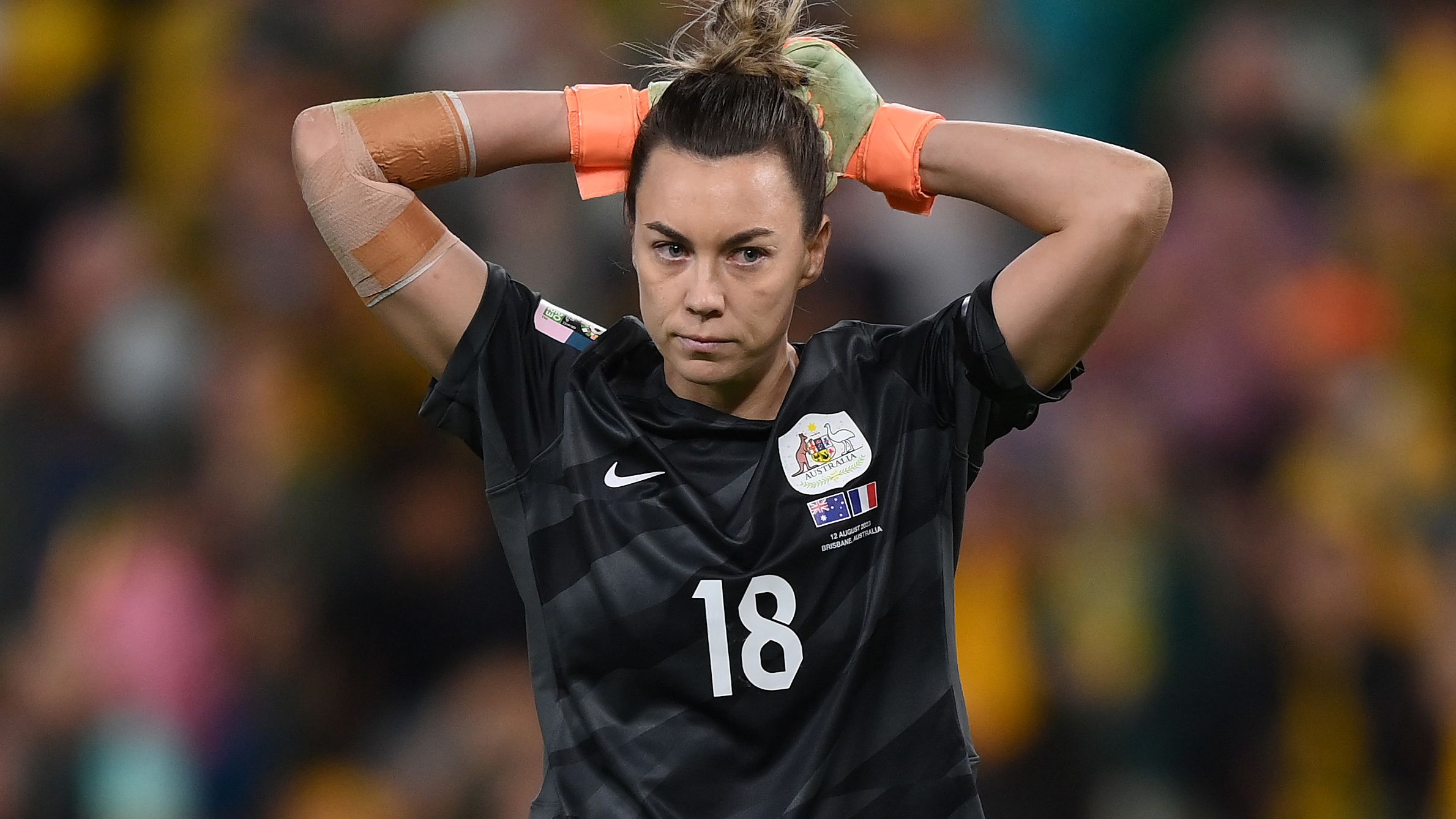 Mackenzie Arnold of Australia reacts after missing her team&#x27;s fifth penalty in the shootout against France.