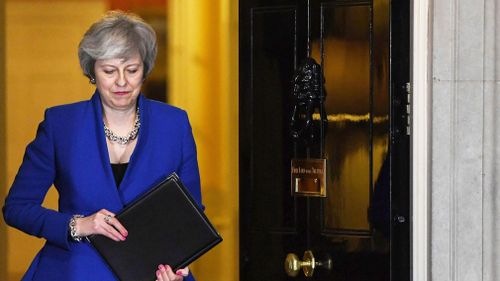 British Prime Minister Theresa May was consulting opposition parties and other lawmakers Thursday in a battle to put Brexit back on track after surviving a no-confidence vote.