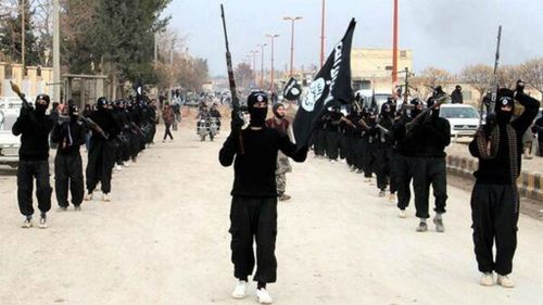 Fighters from the Islamic State group march in Raqqa, Syria. (AP)