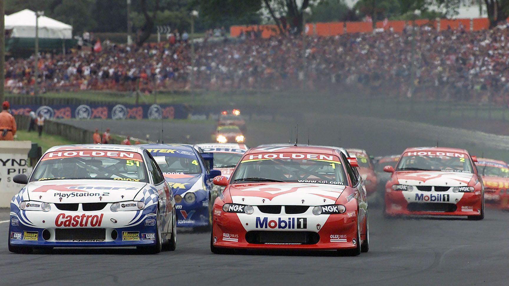 Greg Murphy (No.51) in his Holden Commodore VX races down the straight next to championship winner Mark Skaife (No.1) at Pukekohe Park.