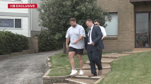 Former Dragons player Trent Merrin was arrested at his home this morning. 
