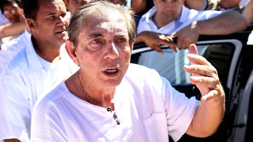 Spiritual healer Joao Teixeira de Faria, better known as John of God, arrives to the Dom Inacio Loyola House in Abadiania, Brazil