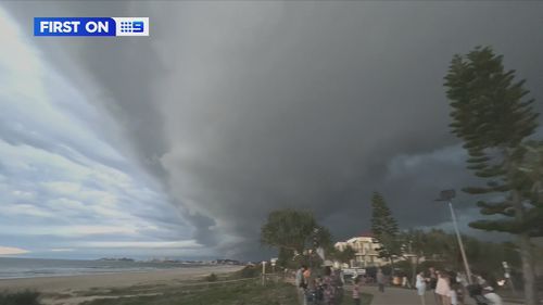 South-east Queensland has been battered by wild winds, lightning and golf-ball-sized hail, destroying a single mother's home in Brisbane's south.