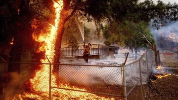 Capt. Jesse Campbell works to save the Louis Stralla Water Treatment Plant as the Glass Fire burns in St. Helena.
