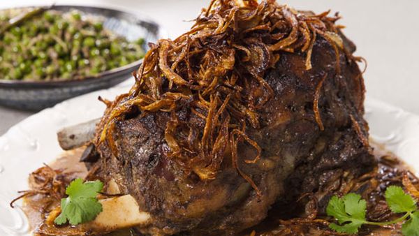 Anjum Anand's spiced slow-roast lamb shoulder with edgy peas