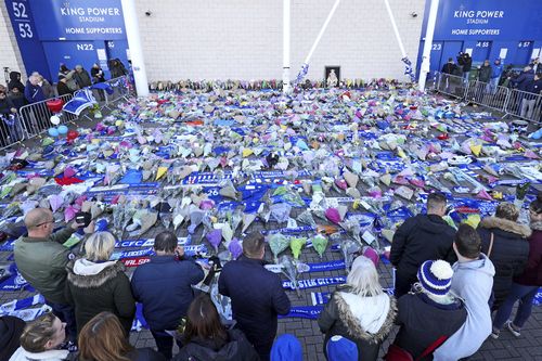 Flowers and wreaths have been laid outside the stadium following the crash.