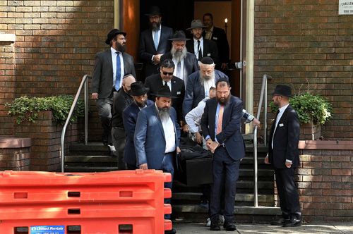 The casket of Bondi massacre victim Alexandria Kleytman is carried from Sydney Chevra Kadisha where the funeral was held. Woollhara, NSW.