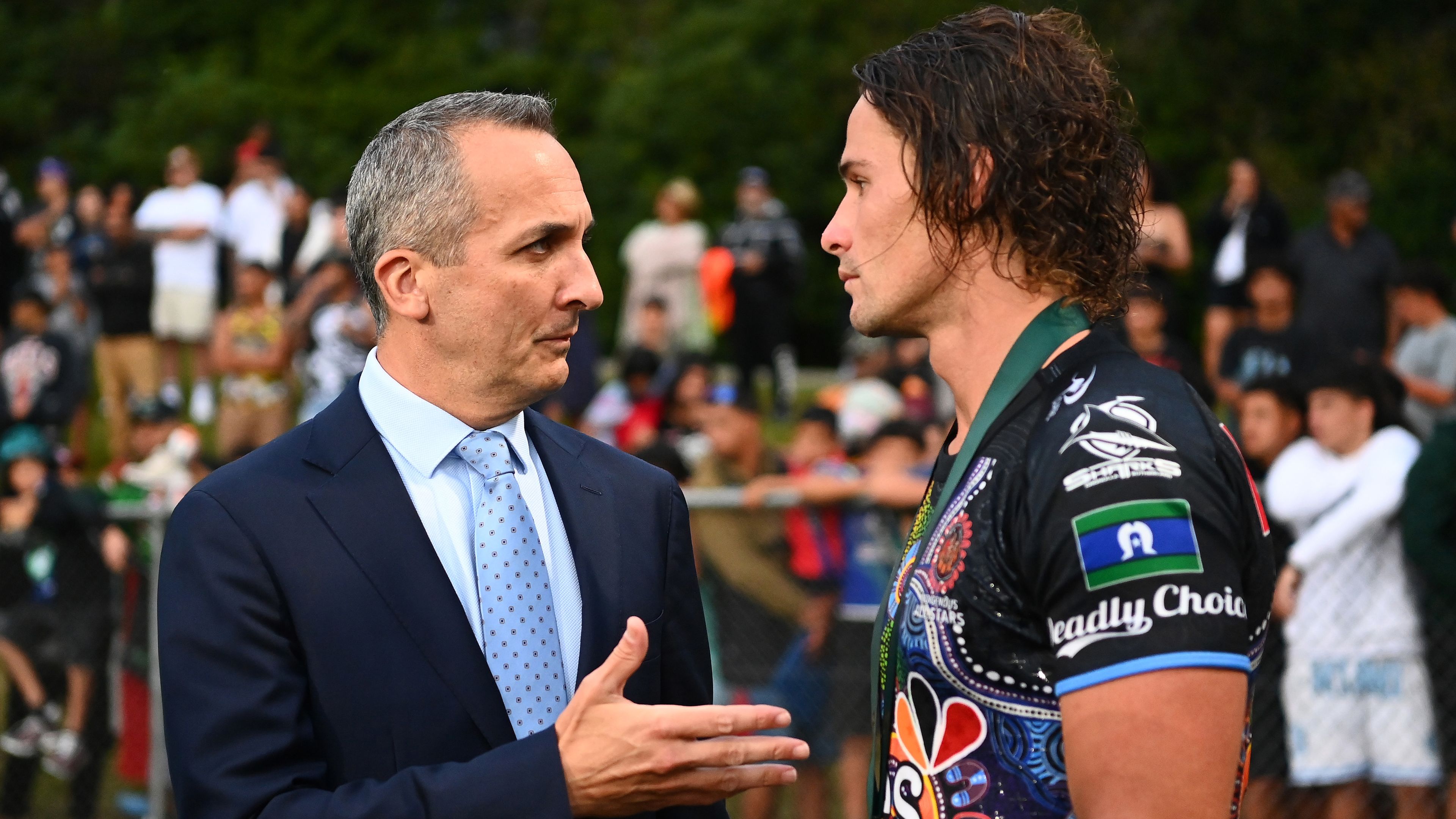 ROTORUA, NEW ZEALAND - FEBRUARY 11: Andrew Abdo, NRL CEO talks to Nicholas Hynes of the Indigenous All Stars during the 2023 NRL All Stars match between Indigenous All Stars and Maori All Stars at Rotorua International Stadium on February 11, 2023 in Rotorua, New Zealand. (Photo by Hannah Peters/Getty Images)
