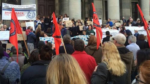 Thousands take to the steps of South Australian parliament calling for two students to be released from detention