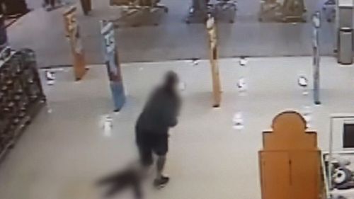 In CCTV vision from a Big W store at the Nambour Plaza shoping centre, the man can be seen dragging the four-year-old girl along the ground. Picture: Supplied.