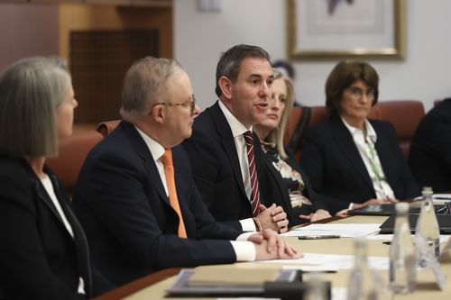 Prime Minister Anthony Albanese and Treasurer Jim Chalmers at the opening of the Economic Reform Roundtable at Parliament House in Canberra today. Photo: Dominic Lorrimer