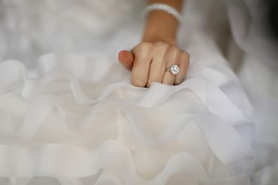 Bride sitting in dress