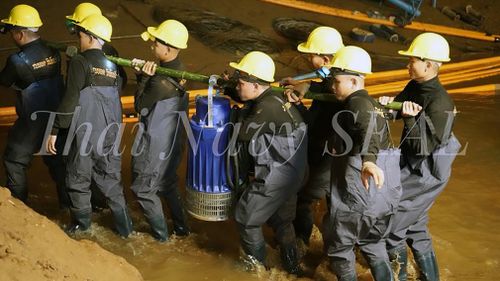 Rescue teams have been pumping out water from the flooded cave. Picture: AAP