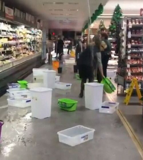Supermarkets and shops have reported leaking roofs and flooding. (9NEWS)