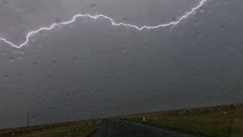 Lightning dances across the sky near Griffith, NSW. Severe storms brought torrential rain to the Riverina in the state's south west. 
