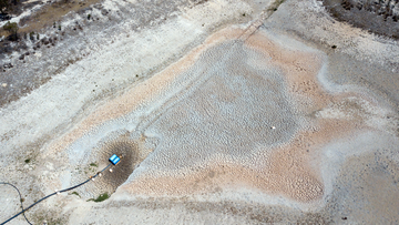 An aerial view of a dried up dam at Cottonvale apple orchard, outside of Stanthorpe.