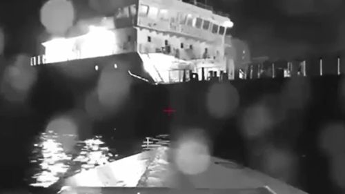 In this image from video made available on Saturday, Aug. 5, 2023, a seaborne drone approaches a Russian tanker on the Black Sea. Ukrainian drones have hit a Russian tanker in the Black Sea near Crimea, according to Russian officials. The strike was the second sea attack involving drones in one day, after Ukraine said its sea drones also struck a major Russian port earlier on Friday