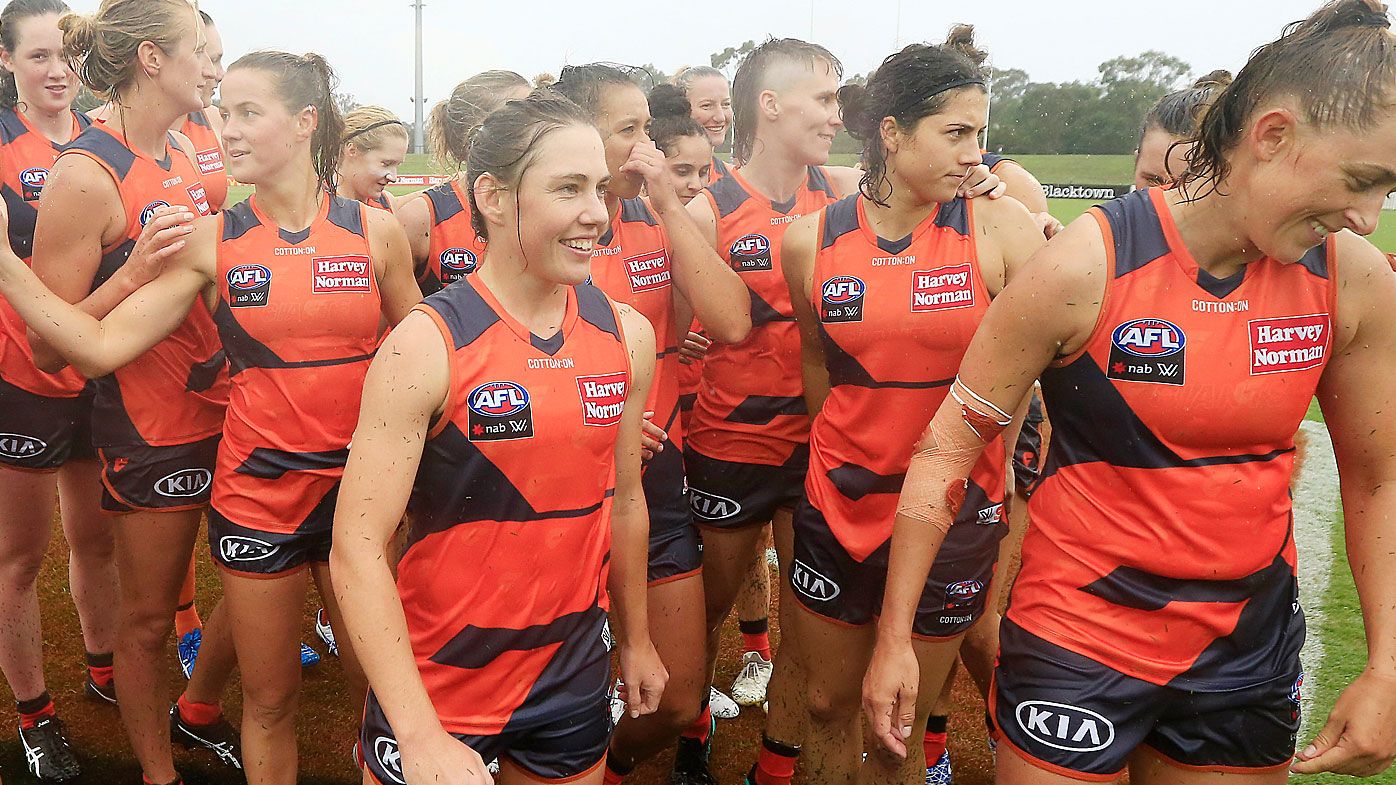 The Giants celebrate their win during the round one AFLW match