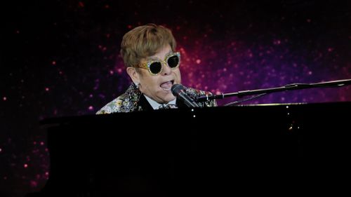 British musician and composer Elton John performs at a press conference in New York, New York. (AAP)