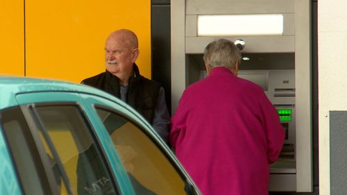 Older couples protect themselves by going to the ATM in pairs.