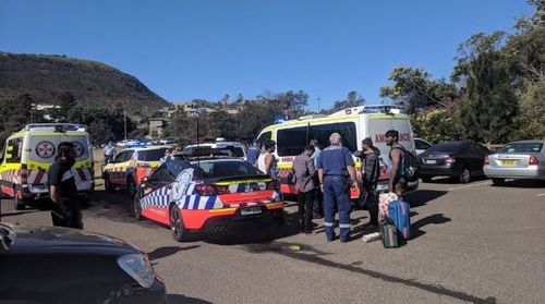 A man was pulled from the water in Stanwell Park, south of Sydney.
