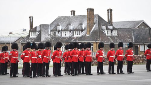 Officers and guardsmen of 1st Battalion the Irish Guards. (PAA/AAP)