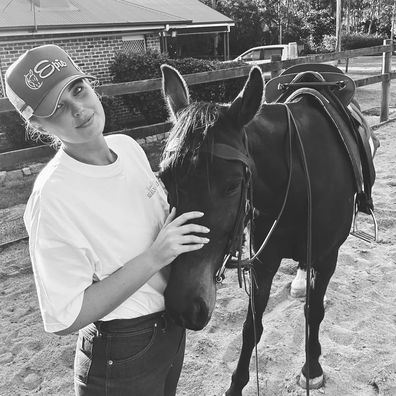 Georgina Burke poses with a horse.