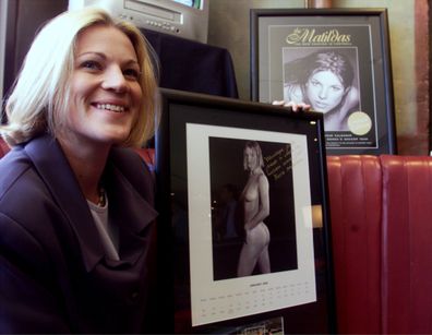 Tracie McGovern with her picture in the 1999 Matildas nude calendar