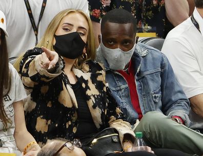 Singer Adele looks on next to Rich Paul during the first half in Game Five of the NBA Finals between the Milwaukee Bucks and the Phoenix Suns at Footprint Center on July 17, 2021 in Phoenix, Arizona. 