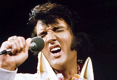 Elvis Presley performing in Hawaii in 1973 (Getty)