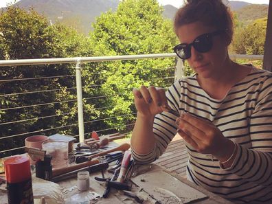Argent Silversmith founder Elizabeth Herman making jewellery in her home.