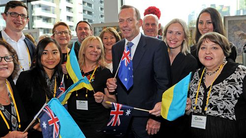 Tony Abbott with admirers. (AAP)