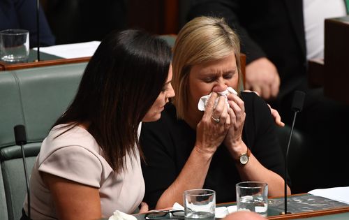 Labor member Emma Husar consoles Susan Lamb (right) after her tearful speech to 
Parliament (AAP ).