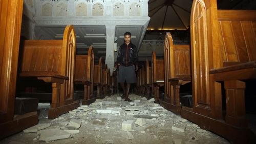 Debris in Bali from collapsed buildings and the Lombok earthquake